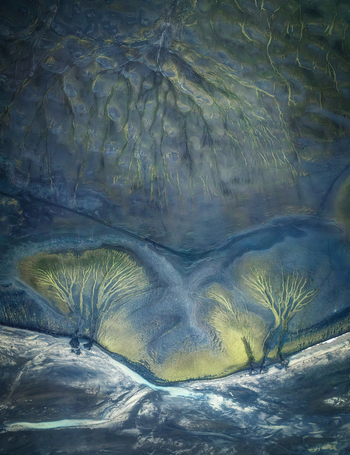 Aerial view of the intricate braided river patterns and sediment deposits in the Fjallabak Nature Reserve Rangarthing ytra Iceland.