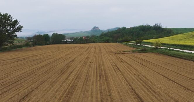 Aerial view of Balze del Valdarno and plowed fields in Tuscany Italy. Aerial view of Balze del Valdarno and plowed fields in Tuscany Italy.