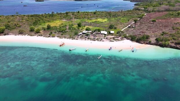 Aerial view of Pink Beach and turquoise waters Indonesia. Aerial view of Pink Beach and turquoise waters Indonesia.