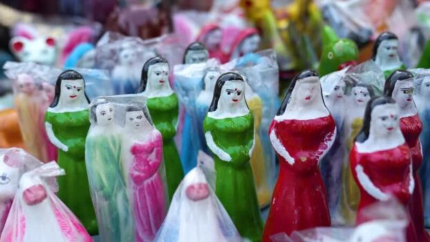View of traditional colorful clay dolls at a market Bangladesh.