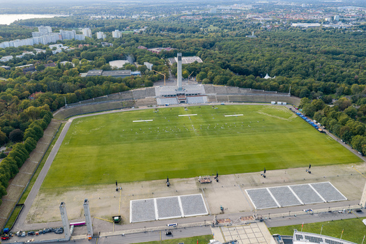 Berlin Berlin Germany 26 September 2026 Aerial view of the Maifeld at the Olympiastadion Berlin featuring the large green field the Bell Tower and surrounding trees.
