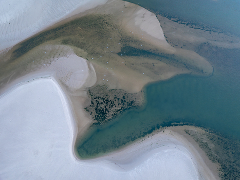 Aerial view of Lagoa de Obidos with its winding sandbanks and clear turquoise waters in Foz do Arelho Leiria District Portugal. Aerial view of Lagoa de Obidos with its winding sandbanks and clear turquoise waters in Foz do Arelho Leiria District Portugal.