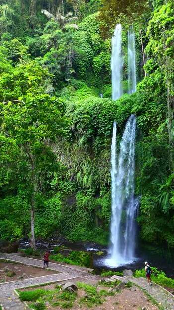 Aerial view of Sendang Gile Waterfall in the jungle Indonesia. Aerial view of Sendang Gile Waterfall in the jungle Indonesia.