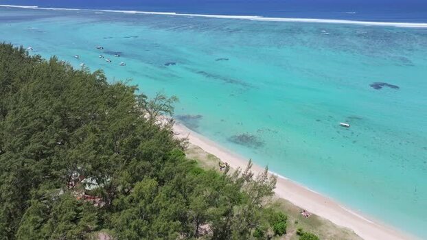 Aerial view of Le Morne beach and turquoise waters Mauritius.