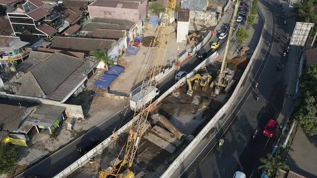 Aerial view of road construction site in Yogyakarta Indonesia. Aerial view of road construction site in Yogyakarta Indonesia.