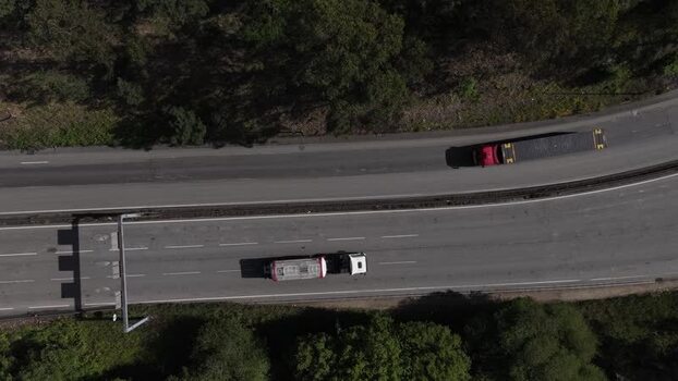 Aerial view of a truck carrying a shipping container Portugal.