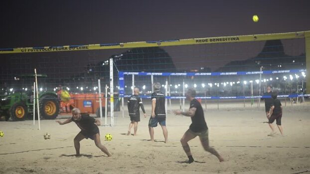 View of people playing footvolley at Copacabana Beach Brazil.