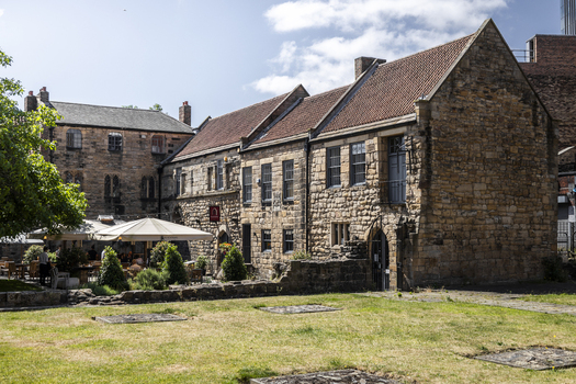 Newcastle upon Tyne United Kingdom 13 July 2026 View of the historic Blackfriars monastery with its stone walls tiled roof and outdoor seating area in the courtyard. Newcastle upon Tyne United Kingdom 13 July 2026 View of the historic Blackfriars monastery with its stone walls tiled roof and outdoor seating area in the courtyard.