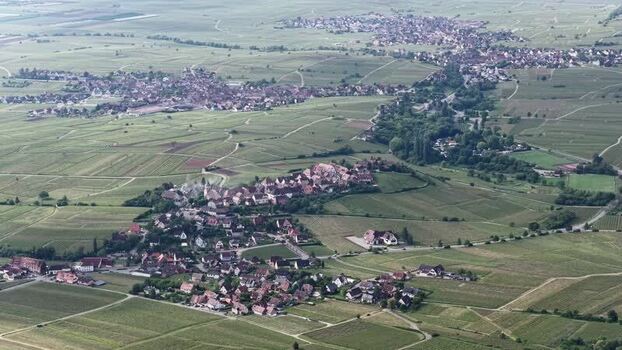 Aerial view of Ribeauville village and surrounding vineyards France. Aerial view of Ribeauville village and surrounding vineyards France.