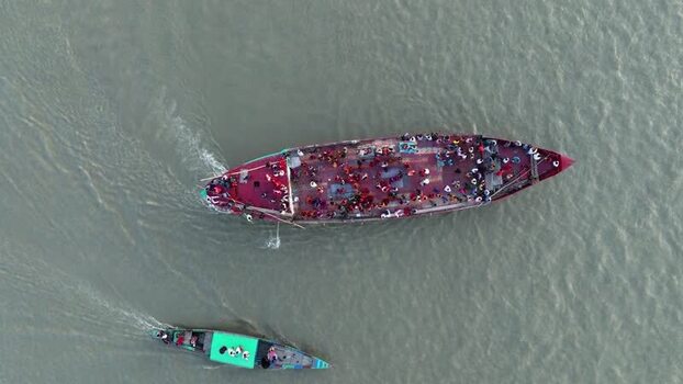 Aerial view of a crowded passenger ferry on a river Bangladesh.