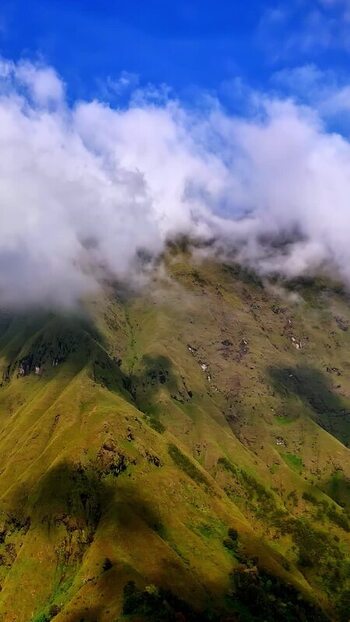 Aerial view of lush green mountain slopes in Bali Indonesia.