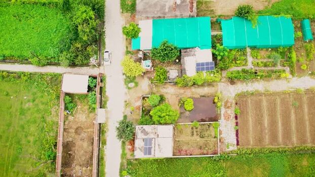Aerial view of solar scheme in rural Lucknow India.