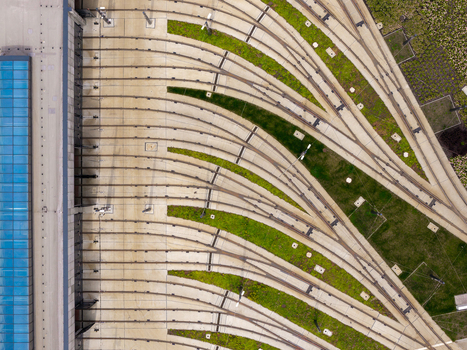Aerial view of the tram tracks at Zajezdnia Annopol 01 with concrete sleepers and green grass strips in Warsaw Masovian Voivodeship Poland. Aerial view of the tram tracks at Zajezdnia Annopol 01 with concrete sleepers and green grass strips in Warsaw Masovian Voivodeship Poland.