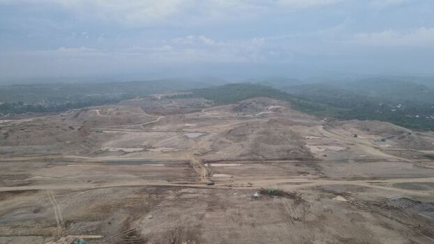 Aerial view of the Dhoho International Airport construction site with extensive earthworks and cleared land in Kecamatan Grogol Jawa Timur Indonesia. Aerial view of the Dhoho International Airport construction site with extensive earthworks and cleared land in Kecamatan Grogol Jawa Timur Indonesia.