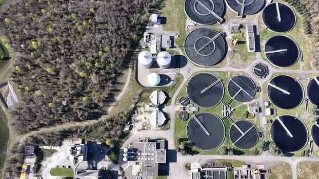 Aerial view of circular tanks at plant France.