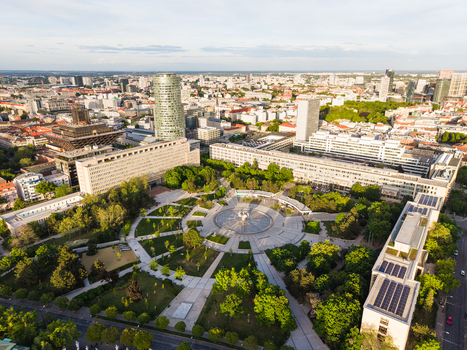 Aerial view of Freedom Square with its central fountain surrounded by lush green trees and urban architecture in Bratislava I Bratislavsky kraj Slovakia. Aerial view of Freedom Square with its central fountain surrounded by lush green trees and urban architecture in Bratislava I Bratislavsky kraj Slovakia.