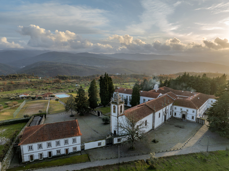 Vila Pouca da Beira Portugal 31 December 2023 Aerial view of Lam Hotel Convento do Desagravo with its historic stone walls red tiled roofs and bell tower. Vila Pouca da Beira Portugal 31 December 2023 Aerial view of Lam Hotel Convento do Desagravo with its historic stone walls red tiled roofs and bell tower.