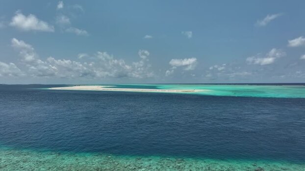 Aerial view of a white sandbank in turquoise waters Maldives. Aerial view of a white sandbank in turquoise waters Maldives.