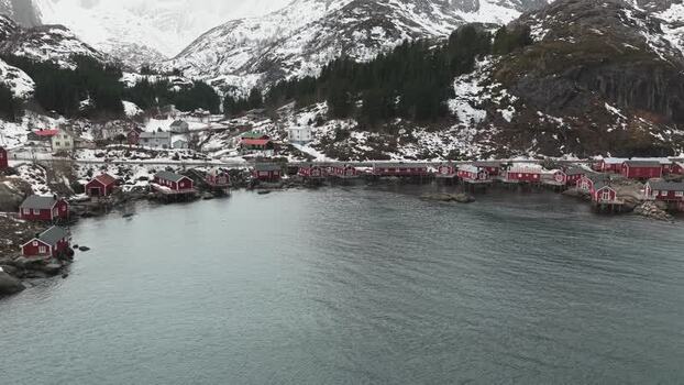 Aerial view of red cabins on the water Norway.