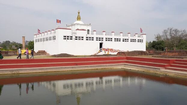 View of Maya Devi Temple and the sacred pond in Nepal.