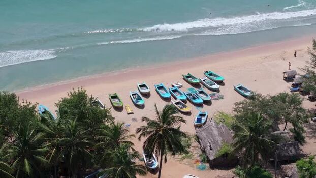 Aerial view of fishing boats on the beach in Trincomalee Sri Lanka.