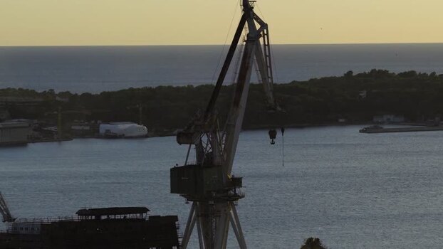 Aerial view of shipyard cranes in Pula Croatia. Aerial view of shipyard cranes in Pula Croatia.