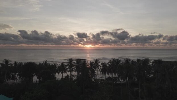 Aerial view of sunrise over Cloud 9 Beach Club Siargao Philippines. Aerial view of sunrise over Cloud 9 Beach Club Siargao Philippines.