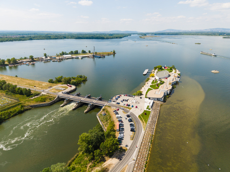 Aerial view of the Danubiana Meulensteen Art Museum situated on a peninsula in the Danube river with lush green banks and a clear blue sky Bratislava Bratislavsky kraj Slovakia. Aerial view of the Danubiana Meulensteen Art Museum situated on a peninsula in the Danube river with lush green banks and a clear blue sky Bratislava Bratislavsky kraj Slovakia.