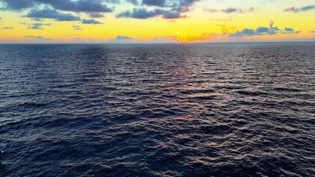 Aerial view of sunset over the Pacific Ocean United States. Aerial view of sunset over the Pacific Ocean United States.