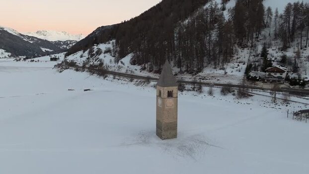 Aerial view of the sunken bell tower in Graun im Vinschgau Italy. Aerial view of the sunken bell tower in Graun im Vinschgau Italy.