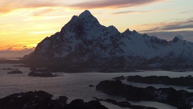 Aerial view of Lofoten mountains at sunset Norway.