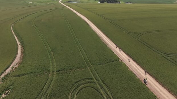 Aerial view of cyclists on a dirt road in Greyton South Africa. Aerial view of cyclists on a dirt road in Greyton South Africa.