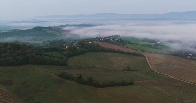 Aerial view of Balze del Valdarno and misty hills in Tuscany Italy. Aerial view of Balze del Valdarno and misty hills in Tuscany Italy.