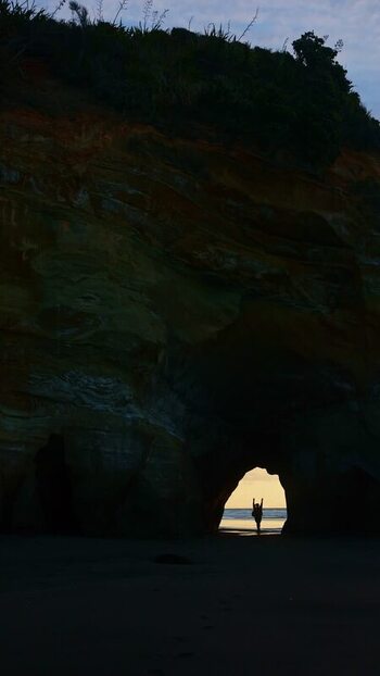 View of a natural rock archway New Zealand. View of a natural rock archway New Zealand.