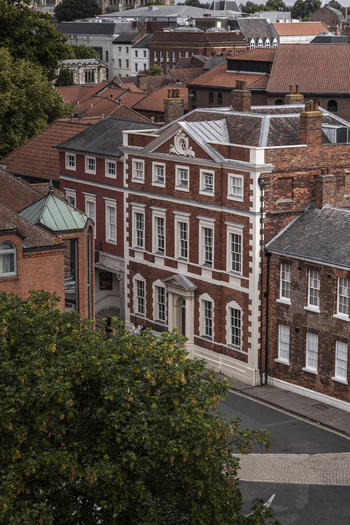 Aerial view of historic red brick buildings and traditional architecture in the city center of York England United Kingdom.