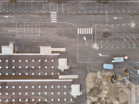 Middenmeer Netherlands 15 April 2026 Aerial view of the Microsoft Datacenter Campus AMS showing parking areas and concrete foundations for a battery park with an excavator.