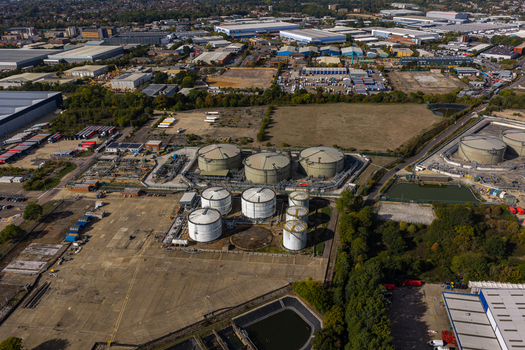Aerial view of Hemel Hempstead Industrial Estate featuring large storage tanks industrial warehouses and surrounding green spaces in Hemel Hempstead England United Kingdom. Aerial view of Hemel Hempstead Industrial Estate featuring large storage tanks industrial warehouses and surrounding green spaces in Hemel Hempstead England United Kingdom.