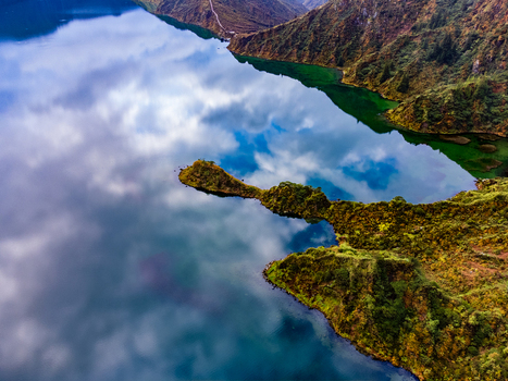 Ribeira Grande Portugal 12 May 2025 Aerial view of Lagoa do Fogo with its turquoise waters reflecting white clouds and surrounded by lush green volcanic slopes. Ribeira Grande Portugal 12 May 2025 Aerial view of Lagoa do Fogo with its turquoise waters reflecting white clouds and surrounded by lush green volcanic slopes.