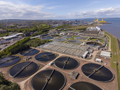 Edinburgh United Kingdom 06 May 2026 Aerial view of the Seafield Wastewater Treatment Works with circular clarifier tanks and industrial facilities along the coast. Edinburgh United Kingdom 06 May 2026 Aerial view of the Seafield Wastewater Treatment Works with circular clarifier tanks and industrial facilities along the coast.