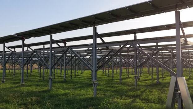 Aerial view of solar panels in a field in Terrasini Italy.