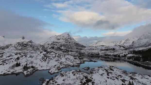 Aerial view of Lofoten mountains and lake in Norway.