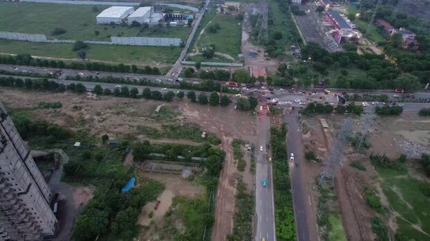 Aerial view of busy traffic intersection in Gurugram India.