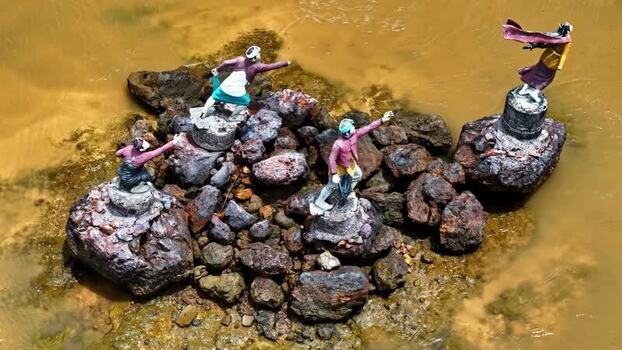 Aerial view of statues in a river in Bali Indonesia.