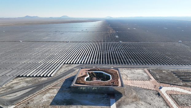 Aerial view of Karapinar Solar Power Plant with vast rows of solar panels stretching across the arid landscape in Karapinar Konya Turkiye.