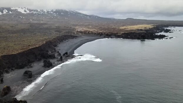Aerial view of Djupalonssandur black sand beach Iceland.