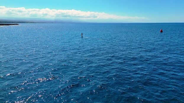 Aerial view of a person on a hydrofoil United States. Aerial view of a person on a hydrofoil United States.