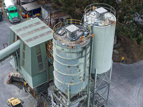 Melbourne Australia 25 September 2026 Aerial view of industrial silos and machinery at a manufacturing facility.