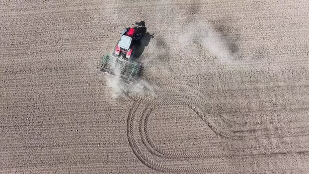 Aerial view of a tractor in a field France.