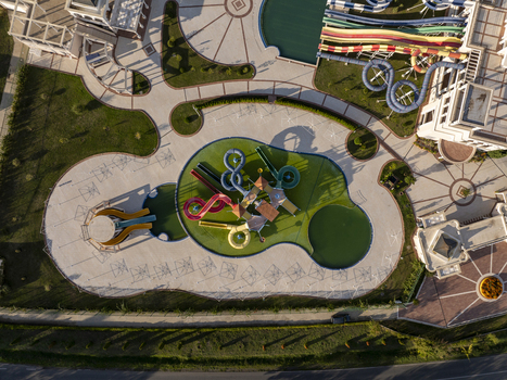 Aerial view of a water park with colorful slides swimming pools and paved walkways in Bulgaria. Aerial view of a water park with colorful slides swimming pools and paved walkways in Bulgaria.