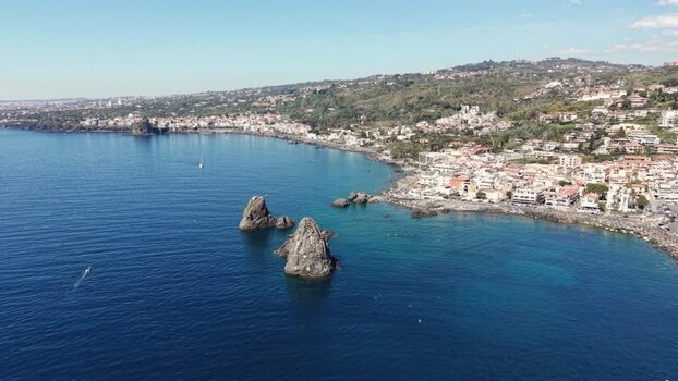 Aerial view of Islands of the Cyclops and Aci Castello Italy.